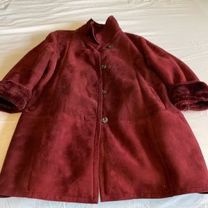 Dellacci sheepskin A-line knee high length coat